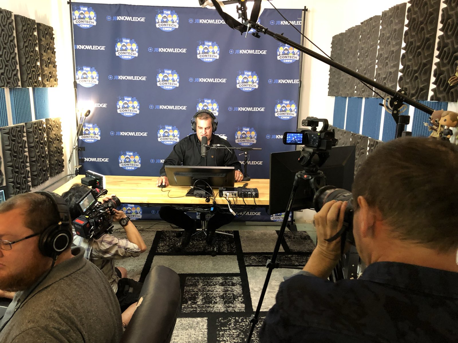 A podcast recording in the studio